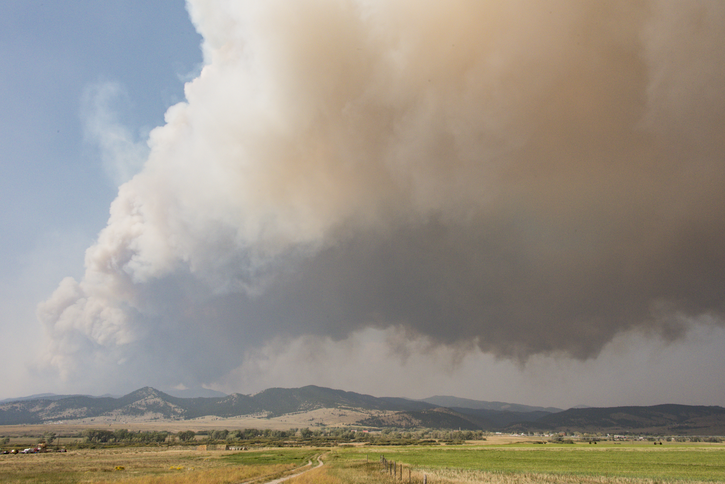 <p>A photo taken around noon on Sept. 18 at the south end of Upper Valley Road shows a plume of smok