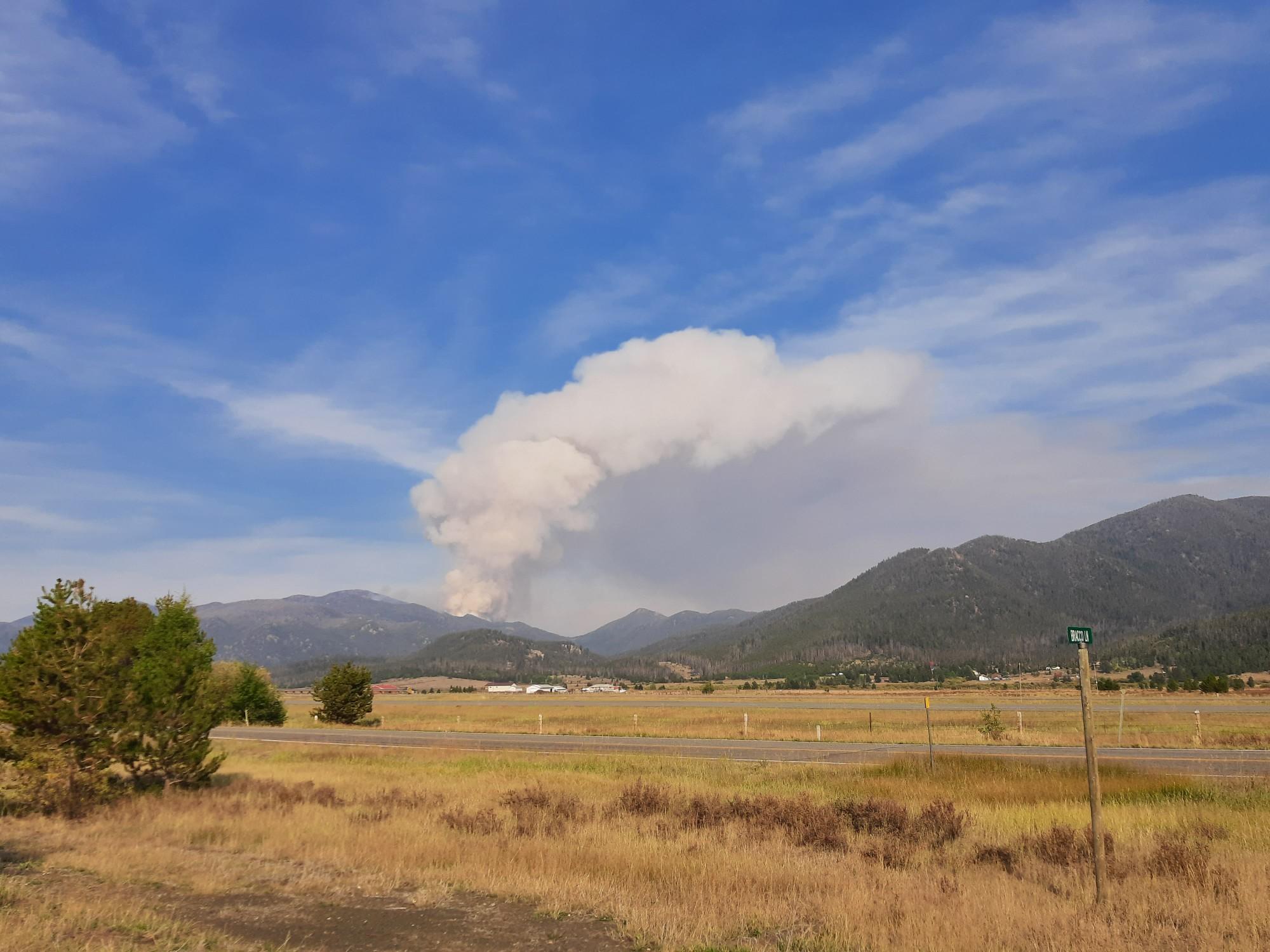 <p>A plume of smoke rises from the Haystack Fire east of Elk Park on Sept. 7.</p><p>A plume of smoke